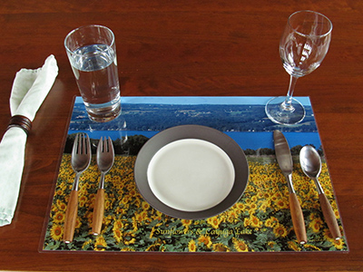 dinner table place setting on a fine art sunflower placemat