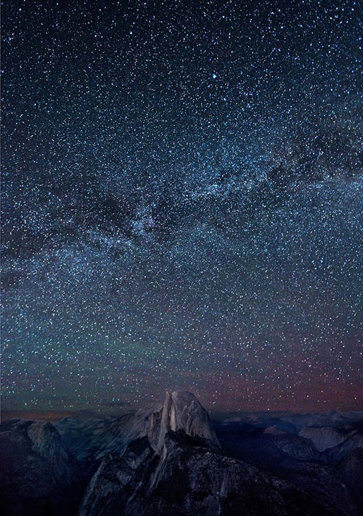 Billions of stars in the Milky Way make Half Dome appear quite small in Yosemite, Nat. Park